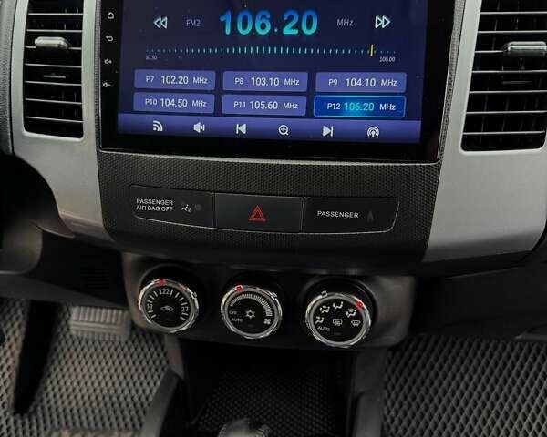 Черный Мицубиси Аутлендер ХЛ, объемом двигателя 2.18 л и пробегом 253 тыс. км за 12500 $, фото 20 на Automoto.ua