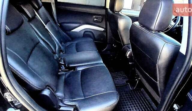 Черный Мицубиси Аутлендер ХЛ, объемом двигателя 2.3 л и пробегом 190 тыс. км за 12500 $, фото 16 на Automoto.ua