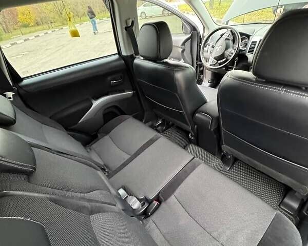 Черный Мицубиси Аутлендер ХЛ, объемом двигателя 2.18 л и пробегом 253 тыс. км за 12500 $, фото 26 на Automoto.ua