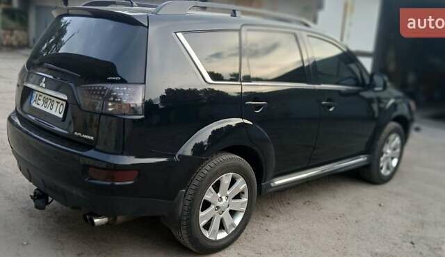 Черный Мицубиси Аутлендер ХЛ, объемом двигателя 2.3 л и пробегом 190 тыс. км за 12500 $, фото 3 на Automoto.ua