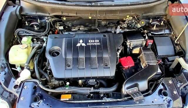 Черный Мицубиси Аутлендер ХЛ, объемом двигателя 2.3 л и пробегом 190 тыс. км за 12500 $, фото 27 на Automoto.ua