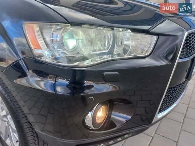 Черный Мицубиси Аутлендер ХЛ, объемом двигателя 2.2 л и пробегом 232 тыс. км за 11600 $, фото 25 на Automoto.ua