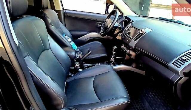 Черный Мицубиси Аутлендер ХЛ, объемом двигателя 2.3 л и пробегом 190 тыс. км за 12500 $, фото 12 на Automoto.ua