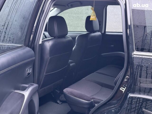 Чорний Міцубісі Аутлендер ХЛ, об'ємом двигуна 2.2 л та пробігом 253 тис. км за 12490 $, фото 10 на Automoto.ua