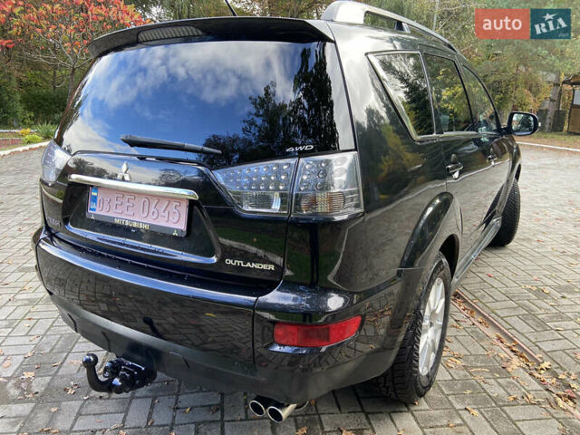 Черный Мицубиси Аутлендер ХЛ, объемом двигателя 2.2 л и пробегом 138 тыс. км за 12250 $, фото 12 на Automoto.ua