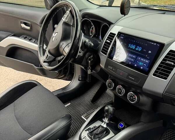 Черный Мицубиси Аутлендер ХЛ, объемом двигателя 2.18 л и пробегом 253 тыс. км за 12500 $, фото 18 на Automoto.ua