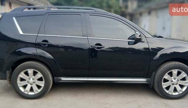 Черный Мицубиси Аутлендер ХЛ, объемом двигателя 2.3 л и пробегом 190 тыс. км за 12500 $, фото 8 на Automoto.ua