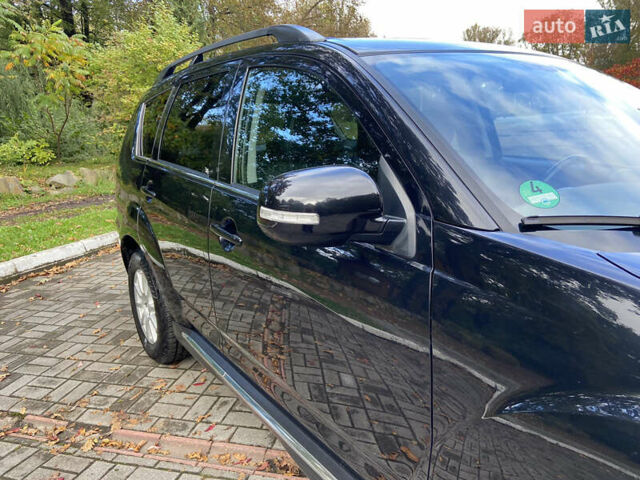 Черный Мицубиси Аутлендер ХЛ, объемом двигателя 2.2 л и пробегом 138 тыс. км за 12250 $, фото 3 на Automoto.ua