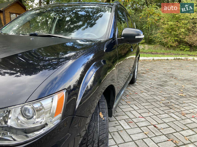 Черный Мицубиси Аутлендер ХЛ, объемом двигателя 2.2 л и пробегом 138 тыс. км за 12250 $, фото 6 на Automoto.ua