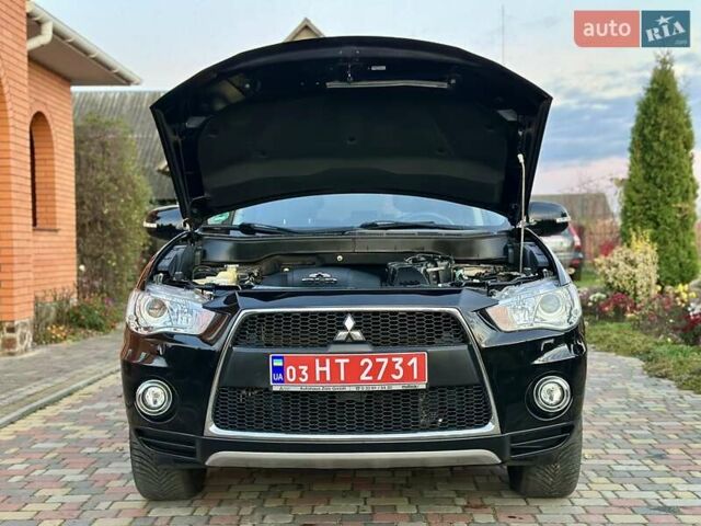 Черный Мицубиси Аутлендер ХЛ, объемом двигателя 2.2 л и пробегом 232 тыс. км за 11700 $, фото 42 на Automoto.ua