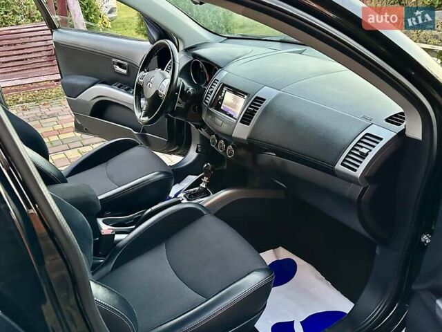 Черный Мицубиси Аутлендер ХЛ, объемом двигателя 2.2 л и пробегом 232 тыс. км за 11700 $, фото 23 на Automoto.ua