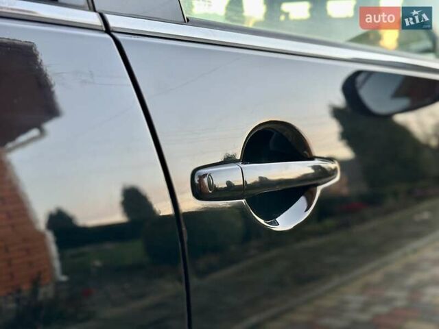 Черный Мицубиси Аутлендер ХЛ, объемом двигателя 2.2 л и пробегом 232 тыс. км за 11700 $, фото 36 на Automoto.ua