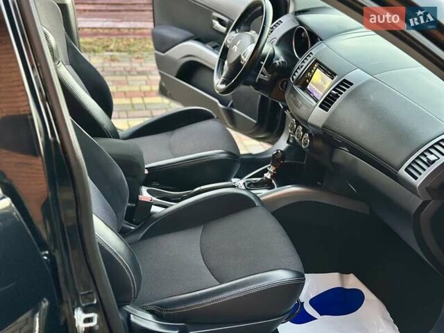 Черный Мицубиси Аутлендер ХЛ, объемом двигателя 2.2 л и пробегом 232 тыс. км за 11700 $, фото 21 на Automoto.ua