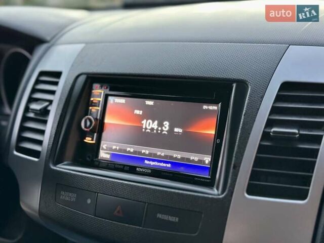 Черный Мицубиси Аутлендер ХЛ, объемом двигателя 2.2 л и пробегом 232 тыс. км за 11700 $, фото 24 на Automoto.ua