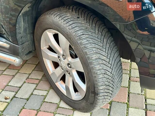 Черный Мицубиси Аутлендер ХЛ, объемом двигателя 2.2 л и пробегом 232 тыс. км за 11700 $, фото 39 на Automoto.ua