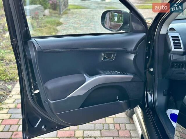 Черный Мицубиси Аутлендер ХЛ, объемом двигателя 2.2 л и пробегом 232 тыс. км за 11700 $, фото 11 на Automoto.ua