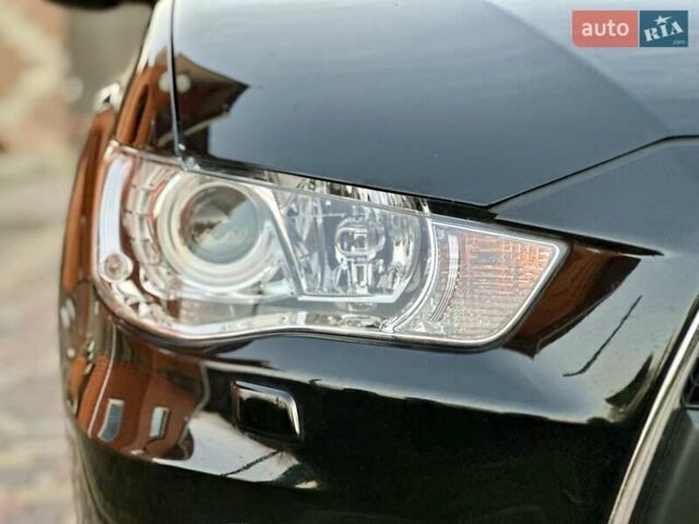 Черный Мицубиси Аутлендер ХЛ, объемом двигателя 2.2 л и пробегом 232 тыс. км за 11700 $, фото 37 на Automoto.ua