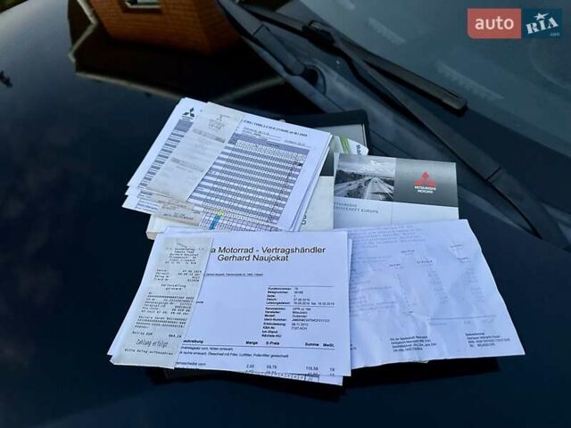 Черный Мицубиси Аутлендер ХЛ, объемом двигателя 2.2 л и пробегом 232 тыс. км за 11700 $, фото 48 на Automoto.ua