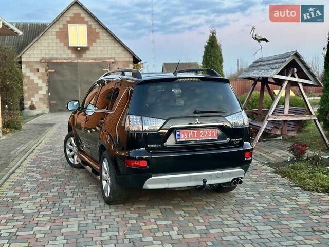 Черный Мицубиси Аутлендер ХЛ, объемом двигателя 2.2 л и пробегом 232 тыс. км за 11700 $, фото 4 на Automoto.ua