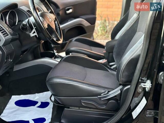 Черный Мицубиси Аутлендер ХЛ, объемом двигателя 2.2 л и пробегом 232 тыс. км за 11700 $, фото 15 на Automoto.ua