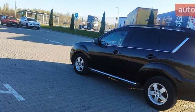 Чорний Міцубісі Аутлендер ХЛ, об'ємом двигуна 2.2 л та пробігом 230 тис. км за 12300 $, фото 1 на Automoto.ua