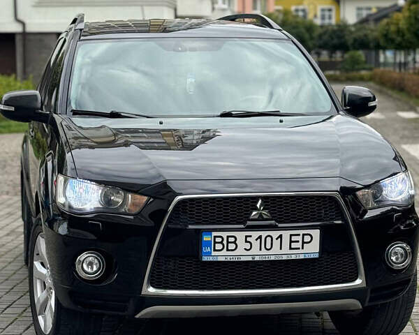 Чорний Міцубісі Аутлендер ХЛ, об'ємом двигуна 2.4 л та пробігом 238 тис. км за 10700 $, фото 1 на Automoto.ua