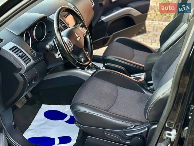 Черный Мицубиси Аутлендер ХЛ, объемом двигателя 2.2 л и пробегом 232 тыс. км за 11700 $, фото 13 на Automoto.ua