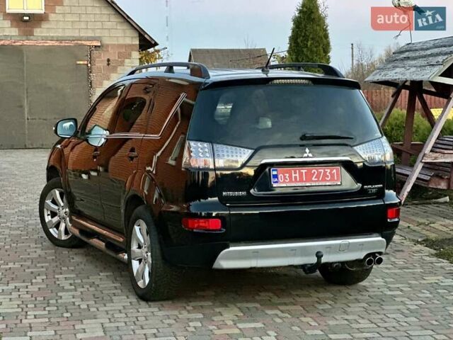Черный Мицубиси Аутлендер ХЛ, объемом двигателя 2.2 л и пробегом 232 тыс. км за 11700 $, фото 8 на Automoto.ua