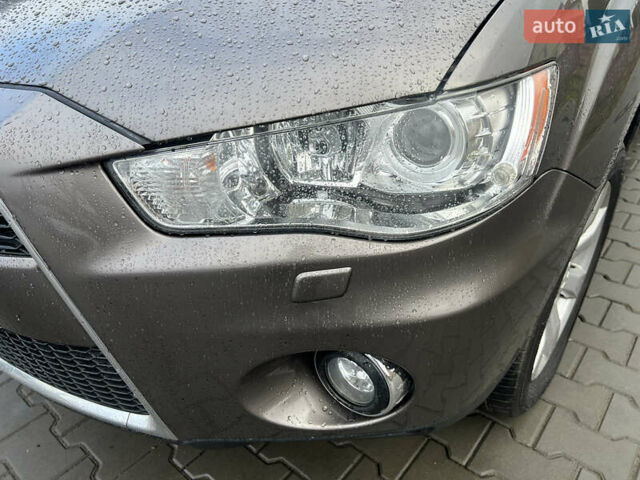 Коричневый Мицубиси Аутлендер ХЛ, объемом двигателя 2.2 л и пробегом 259 тыс. км за 12300 $, фото 2 на Automoto.ua