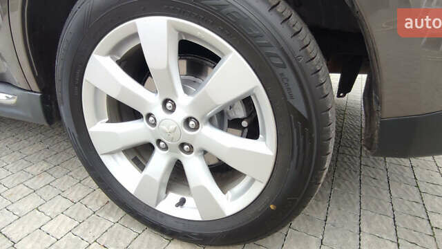 Коричневый Мицубиси Аутлендер ХЛ, объемом двигателя 2.2 л и пробегом 259 тыс. км за 12300 $, фото 43 на Automoto.ua