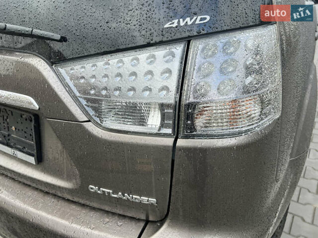 Коричневый Мицубиси Аутлендер ХЛ, объемом двигателя 2.2 л и пробегом 259 тыс. км за 12300 $, фото 7 на Automoto.ua