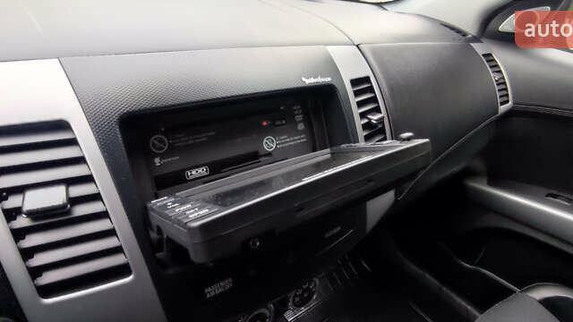 Коричневый Мицубиси Аутлендер ХЛ, объемом двигателя 2.2 л и пробегом 259 тыс. км за 12300 $, фото 40 на Automoto.ua