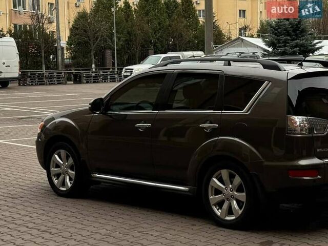 Коричневий Міцубісі Аутлендер ХЛ, об'ємом двигуна 2.36 л та пробігом 160 тис. км за 10900 $, фото 4 на Automoto.ua