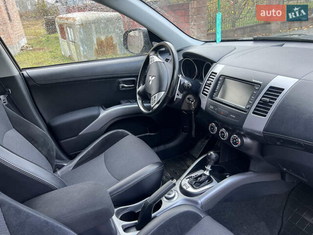 Коричневый Мицубиси Аутлендер ХЛ, объемом двигателя 2.2 л и пробегом 259 тыс. км за 12300 $, фото 3 на Automoto.ua