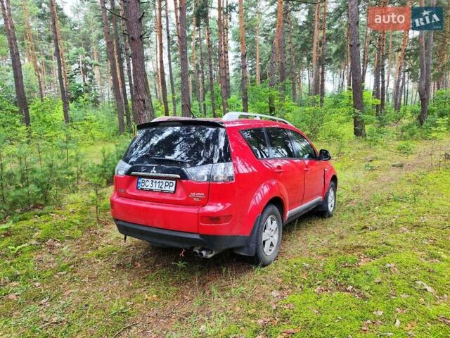 Красный Мицубиси Аутлендер ХЛ, объемом двигателя 2.36 л и пробегом 316 тыс. км за 7000 $, фото 6 на Automoto.ua