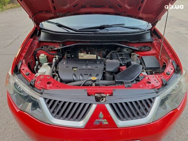 Червоний Міцубісі Аутлендер ХЛ, об'ємом двигуна 0 л та пробігом 148 тис. км за 8450 $, фото 18 на Automoto.ua