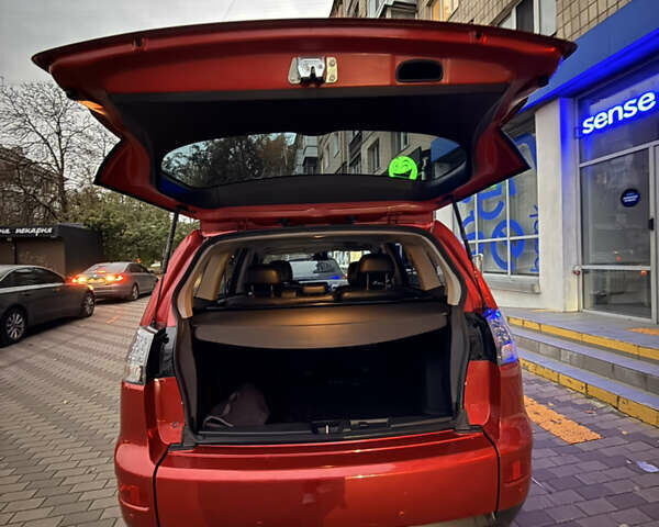 Мицубиси Аутлендер ХЛ 2008 в Киеве на Automoto.ua Красный Мицубиси Аутлендер ХЛ, объемом двигателя 2.4 л и пробегом 99 тыс. км за 11000 $, фото 8 на Automoto.ua