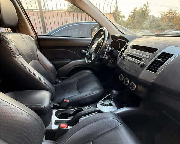 Мицубиси Аутлендер ХЛ 2008 в Киеве на Automoto.ua Красный Мицубиси Аутлендер ХЛ, объемом двигателя 2.4 л и пробегом 99 тыс. км за 11000 $, фото 16 на Automoto.ua