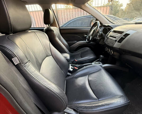 Мицубиси Аутлендер ХЛ 2008 в Киеве на Automoto.ua Красный Мицубиси Аутлендер ХЛ, объемом двигателя 2.4 л и пробегом 99 тыс. км за 11000 $, фото 19 на Automoto.ua