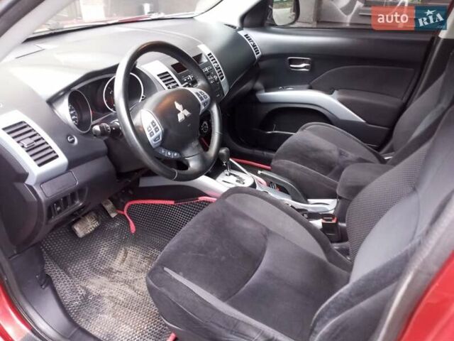 Красный Мицубиси Аутлендер ХЛ, объемом двигателя 2.4 л и пробегом 302 тыс. км за 8900 $, фото 9 на Automoto.ua