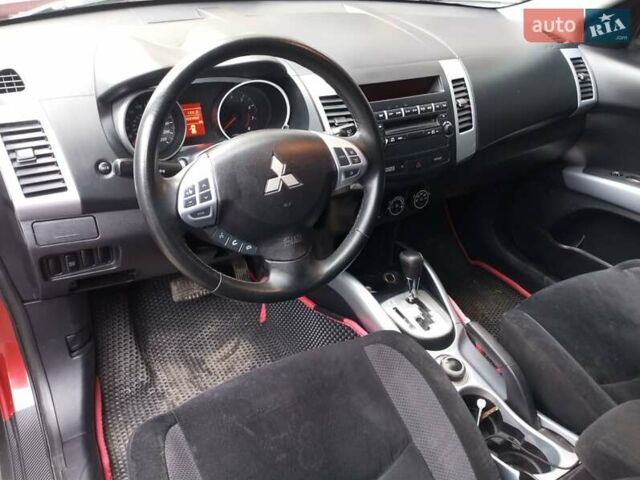 Красный Мицубиси Аутлендер ХЛ, объемом двигателя 2.4 л и пробегом 302 тыс. км за 8900 $, фото 10 на Automoto.ua