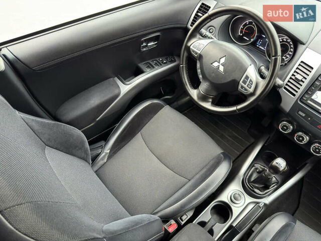 Красный Мицубиси Аутлендер ХЛ, объемом двигателя 2.2 л и пробегом 188 тыс. км за 10550 $, фото 12 на Automoto.ua