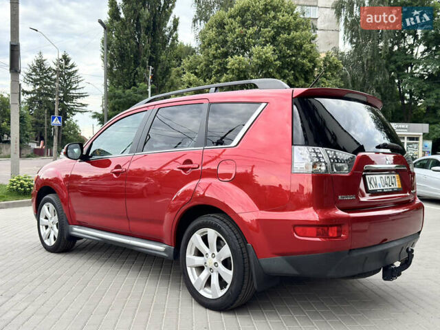 Красный Мицубиси Аутлендер ХЛ, объемом двигателя 2.2 л и пробегом 188 тыс. км за 10550 $, фото 4 на Automoto.ua