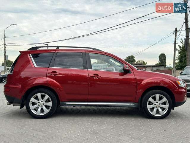 Красный Мицубиси Аутлендер ХЛ, объемом двигателя 2.2 л и пробегом 188 тыс. км за 10550 $, фото 2 на Automoto.ua