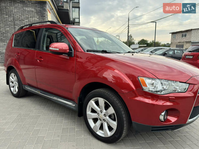 Красный Мицубиси Аутлендер ХЛ, объемом двигателя 2.2 л и пробегом 188 тыс. км за 10550 $, фото 6 на Automoto.ua