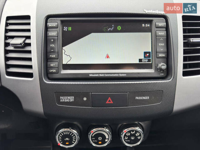 Красный Мицубиси Аутлендер ХЛ, объемом двигателя 2.2 л и пробегом 188 тыс. км за 10550 $, фото 23 на Automoto.ua