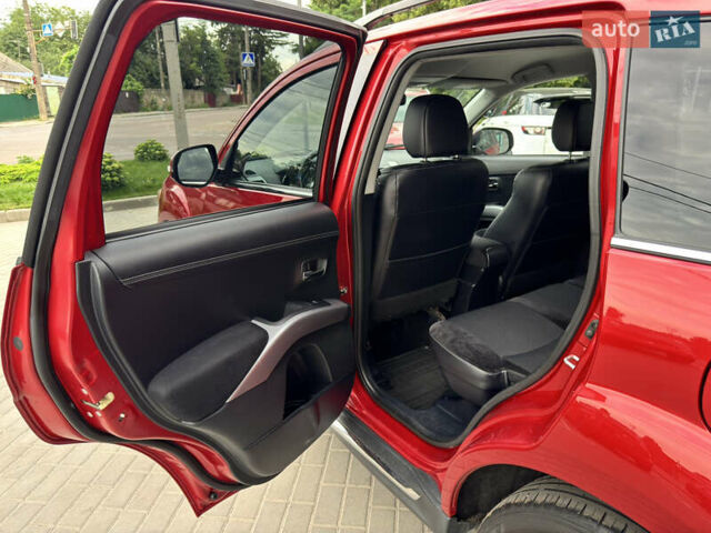 Красный Мицубиси Аутлендер ХЛ, объемом двигателя 2.2 л и пробегом 188 тыс. км за 10550 $, фото 15 на Automoto.ua