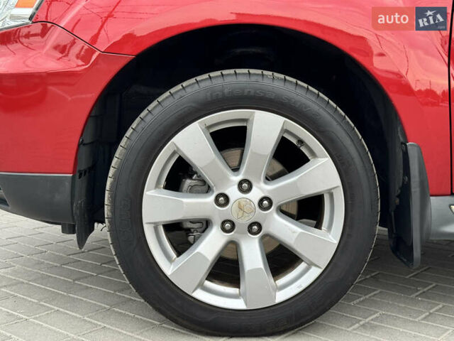 Красный Мицубиси Аутлендер ХЛ, объемом двигателя 2.2 л и пробегом 188 тыс. км за 10550 $, фото 17 на Automoto.ua