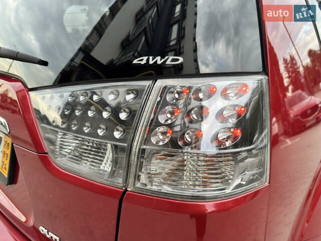 Красный Мицубиси Аутлендер ХЛ, объемом двигателя 2.2 л и пробегом 188 тыс. км за 10550 $, фото 26 на Automoto.ua