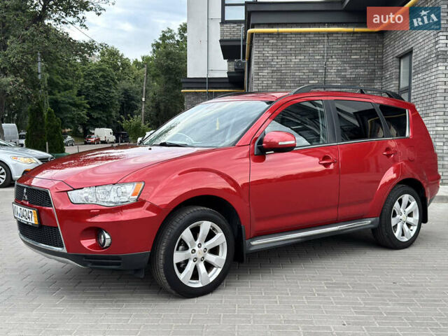 Красный Мицубиси Аутлендер ХЛ, объемом двигателя 2.2 л и пробегом 188 тыс. км за 10550 $, фото 10 на Automoto.ua